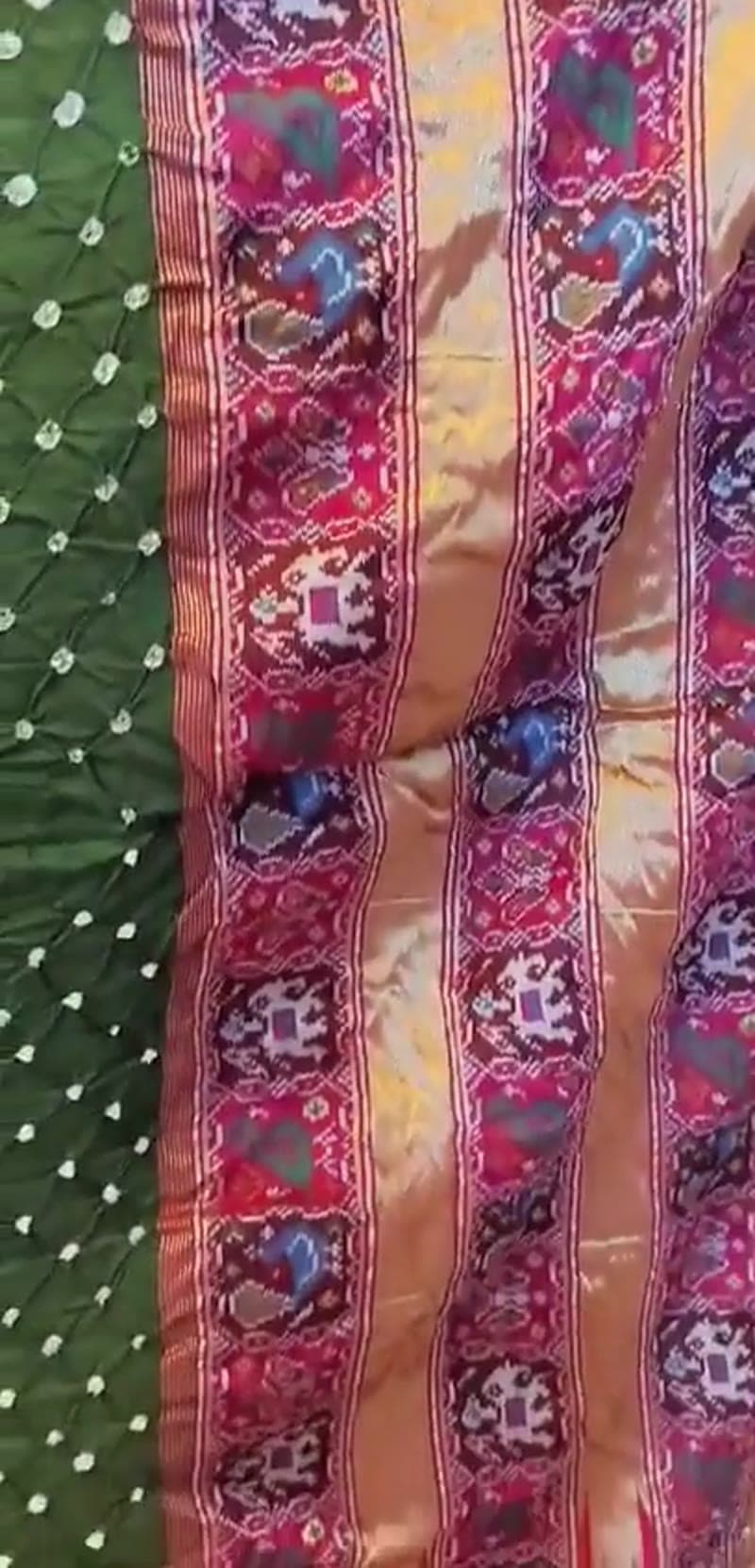 The emerald saree shown in motion