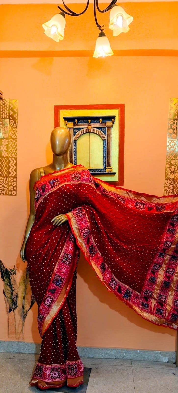 Pallu and border of the vermilion saree