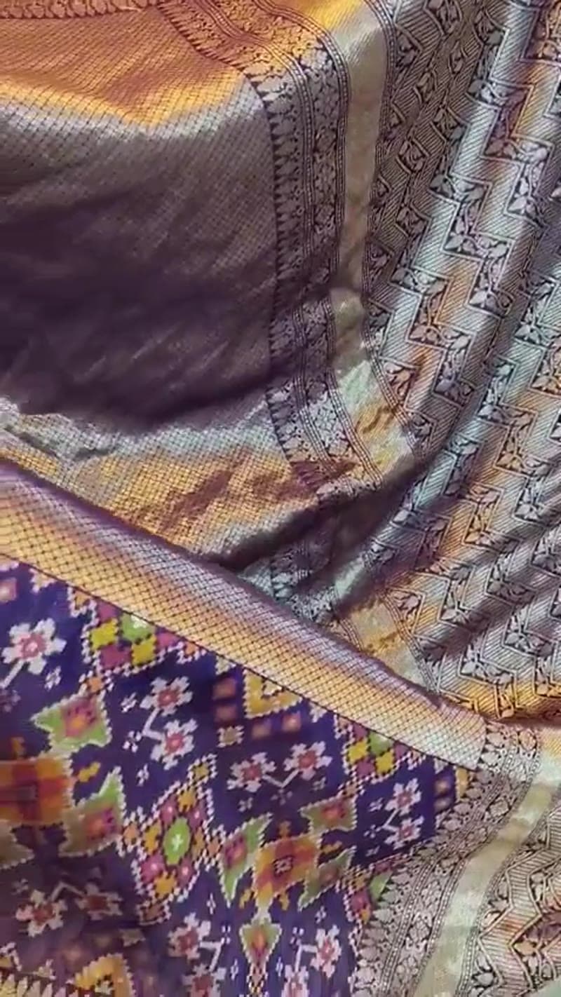 The antique-gold saree shown in motion