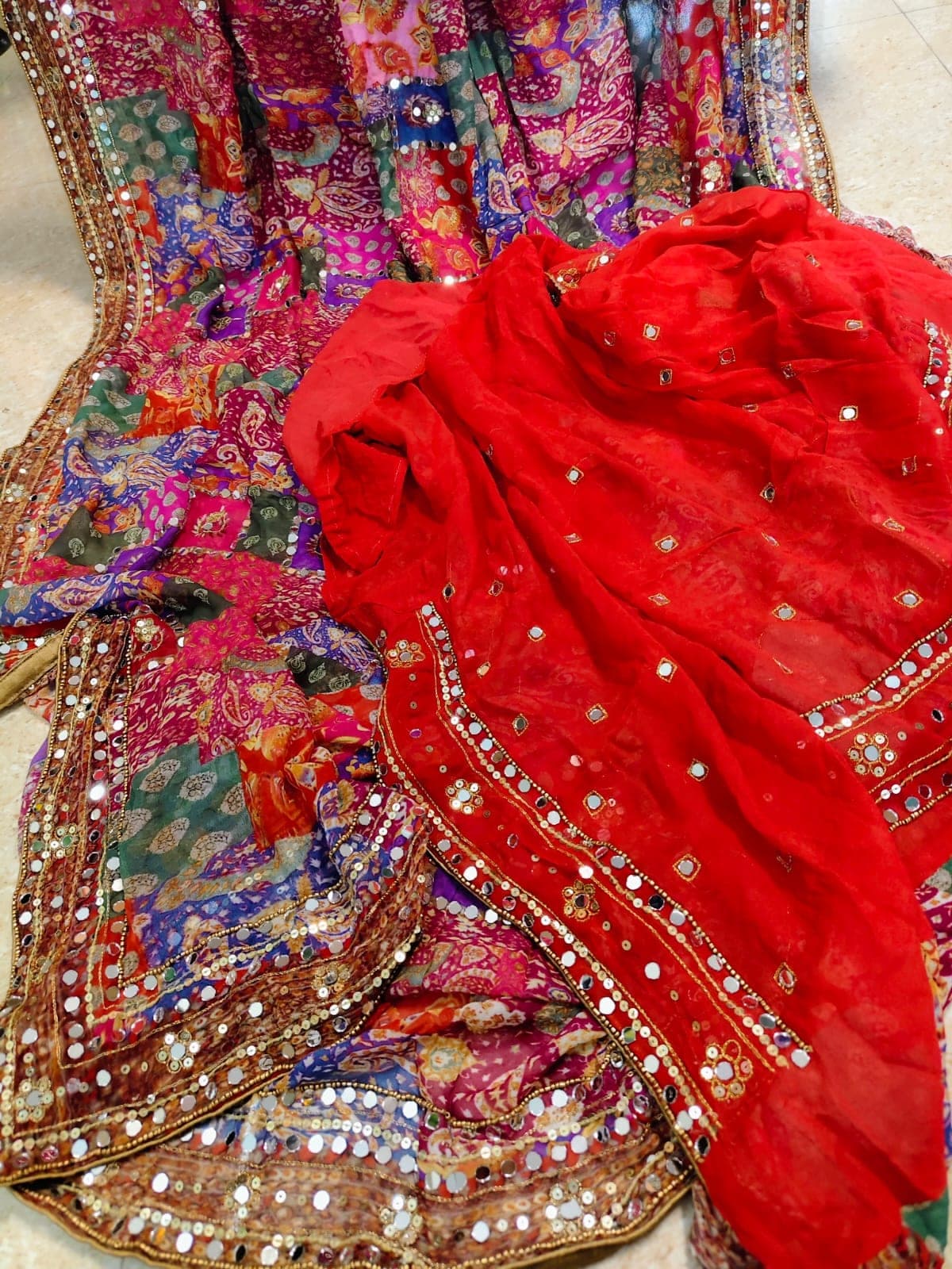 The patchwork saree with its red mirror-work dupatta