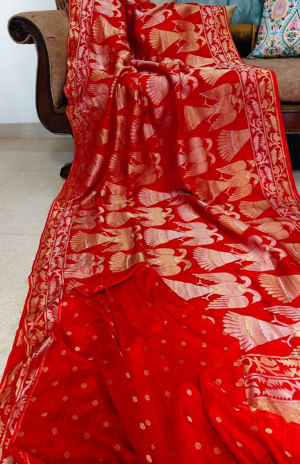 The body and border of the red saree